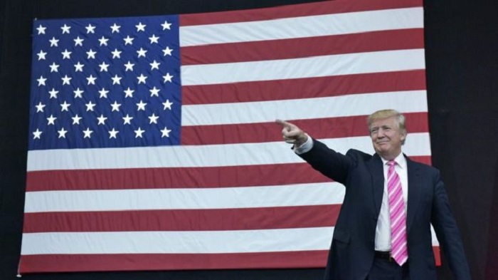 Trump says he will `leave business` to focus on presidency